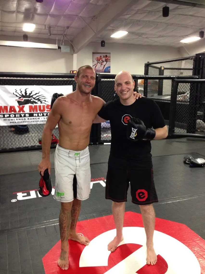 Eitan with Donald "Cowboy" Cerrone after cage work