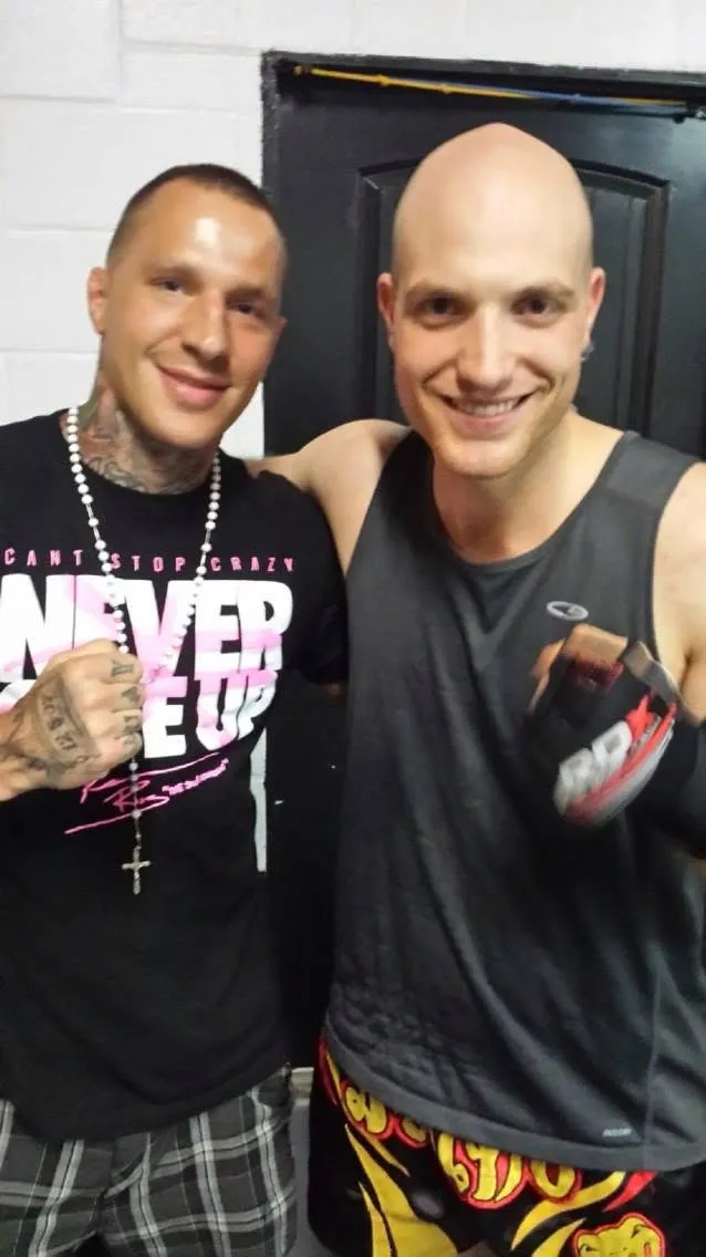 Eitan with Kevin Ross after training